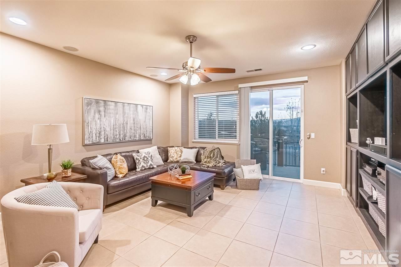 2610 Fury Court Reno, NV 89521 - Photo 18 of 25 a living room with furniture and a flat screen tv