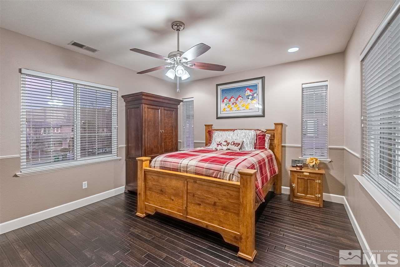 2610 Fury Court Reno, NV 89521 - Photo 23 of 25 a bedroom with a bed and a window