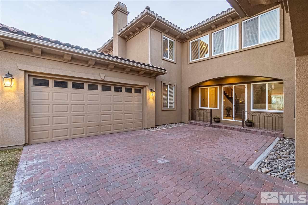 2610 Fury Court Reno, NV 89521 - Photo 24 of 25 a view of a house with a backyard and balcony