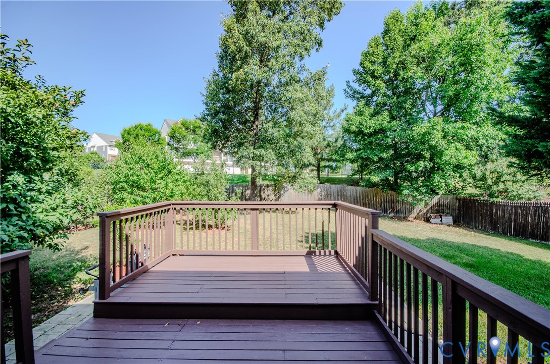 10912 Point Grey Road Henrico, VA 23233 - Photo 34 of 36 Raised wood deck with wood railing, overlooking a