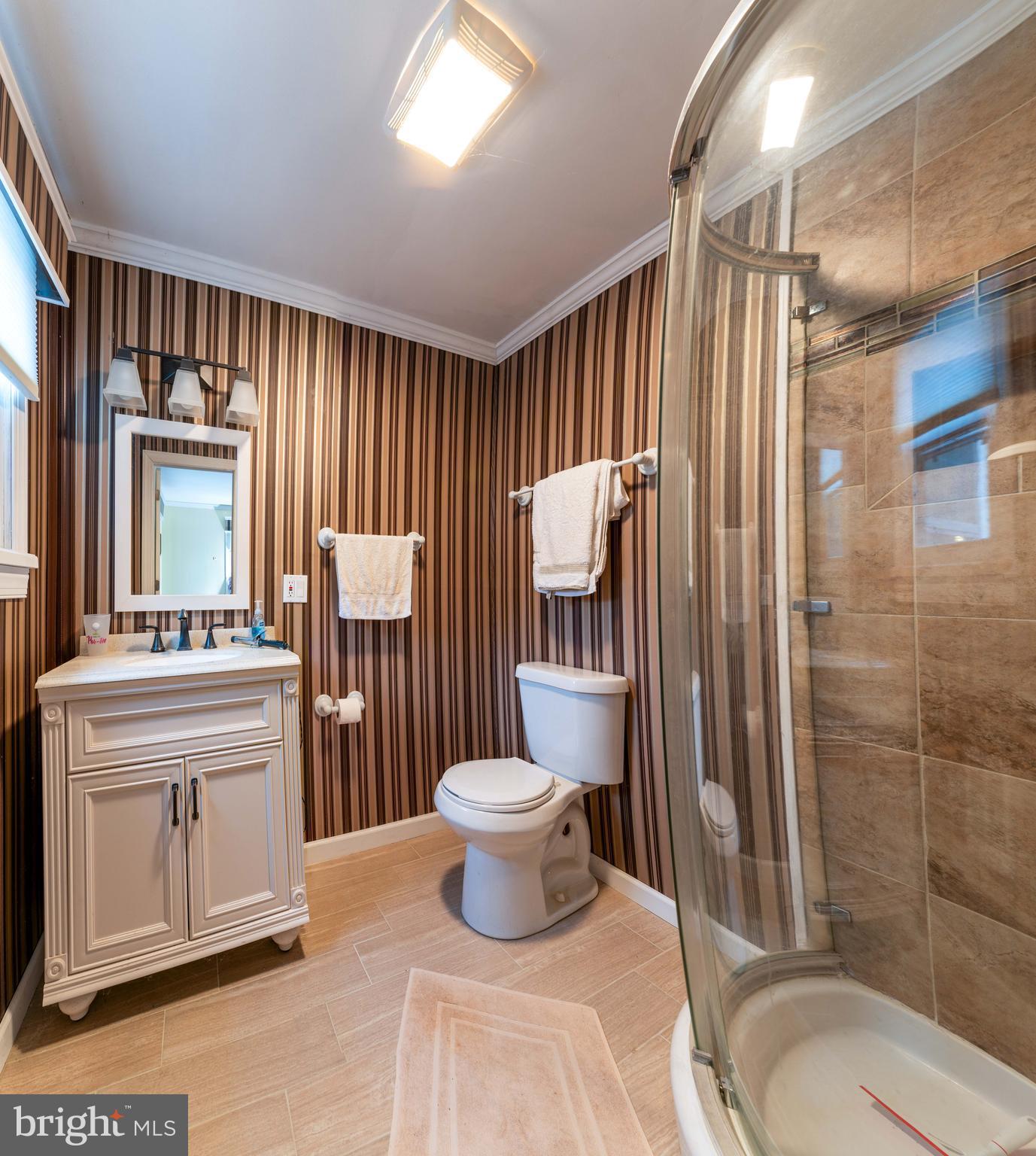 2941 Pheasant Run Road Norristown, PA 19403 - Photo 23 of 23 a bathroom with a sink toilet and shower