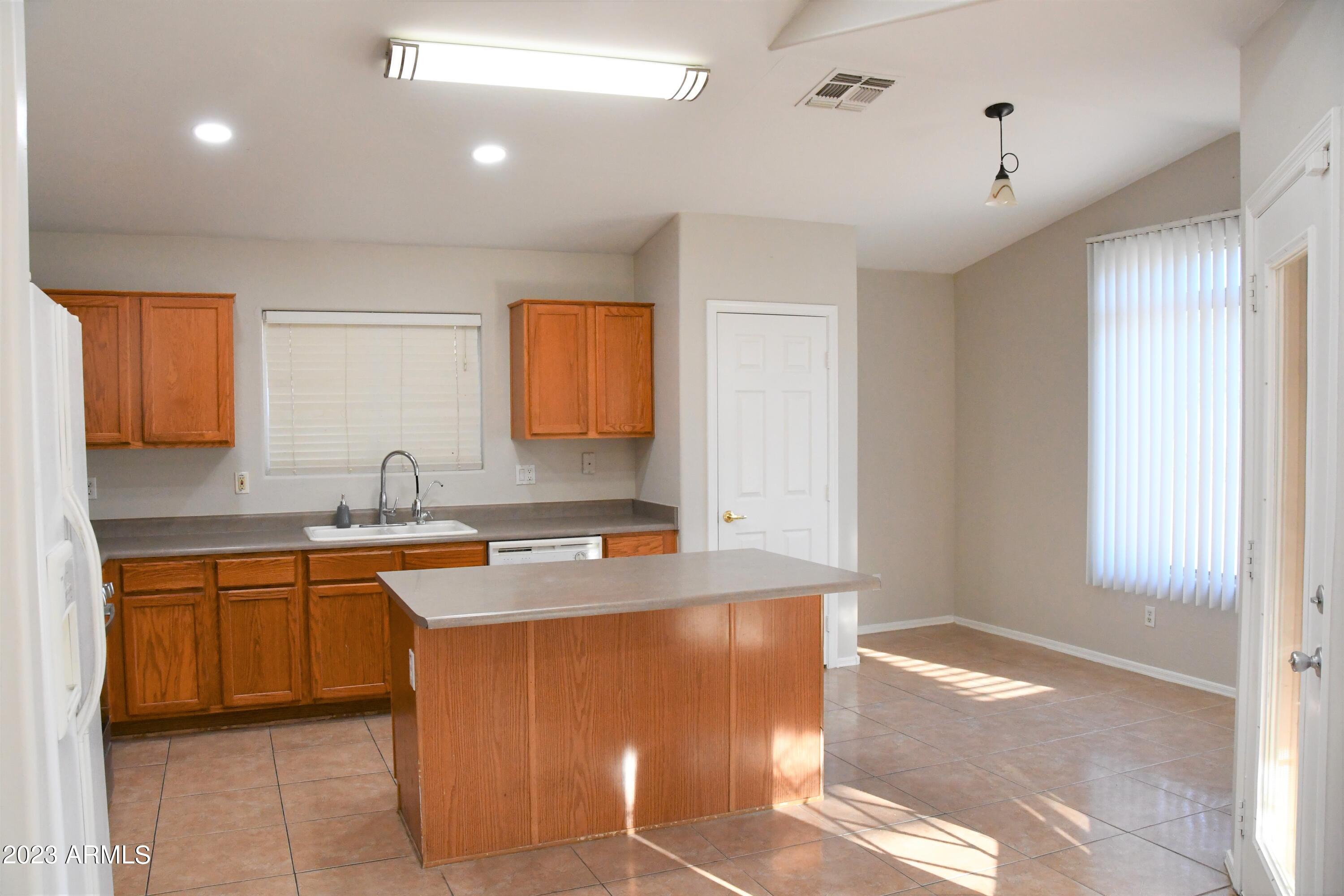10913 West Almeria Road Avondale, AZ 85392 - Photo 4 of 17 DSC_3504