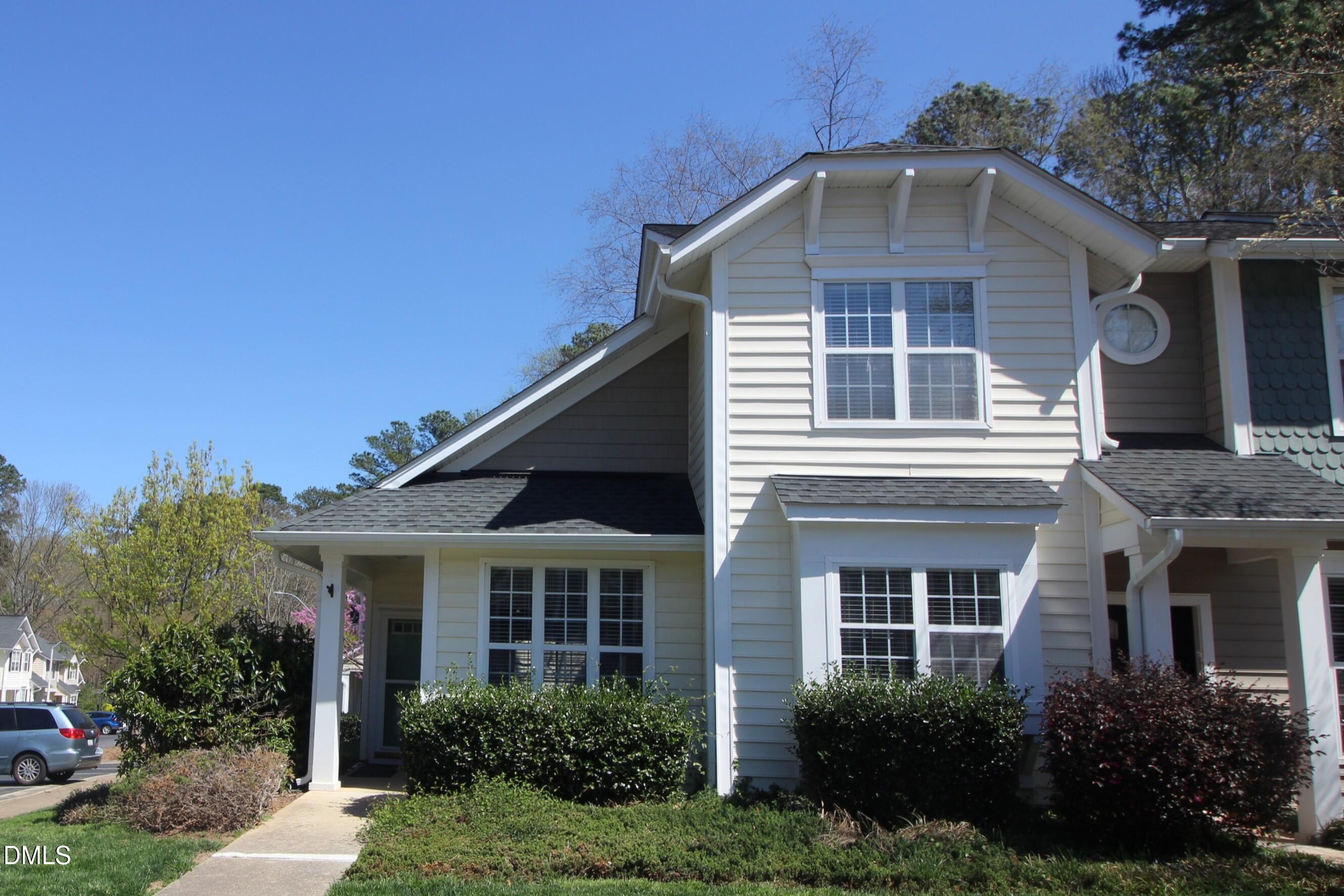 2201 Valley Haven Drive Raleigh, NC 27603 - Photo 1 of 16 a front view of a house with a yard