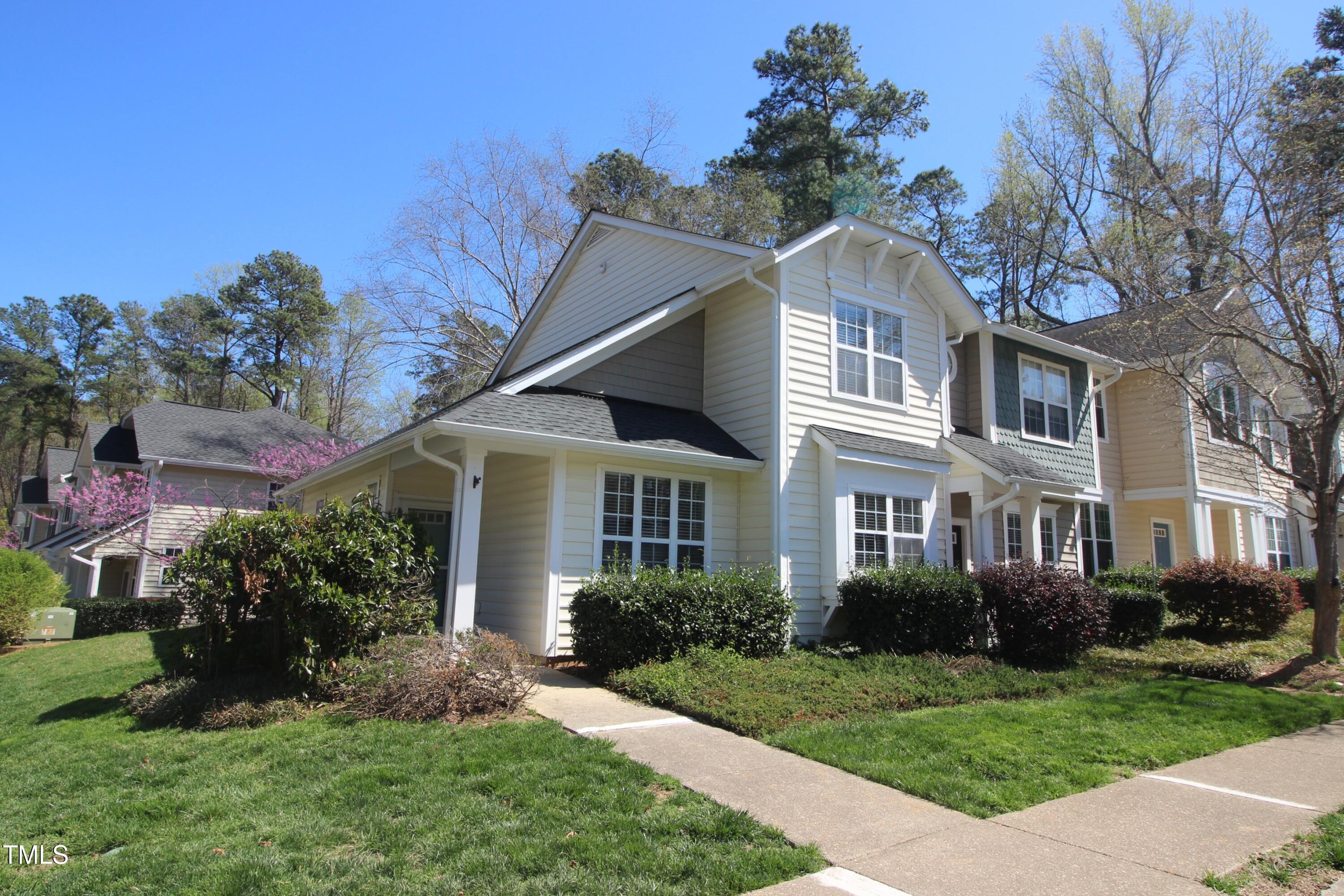 2201 Valley Haven Drive Raleigh, NC 27603 - Photo 2 of 16 a front view of a house with a garden