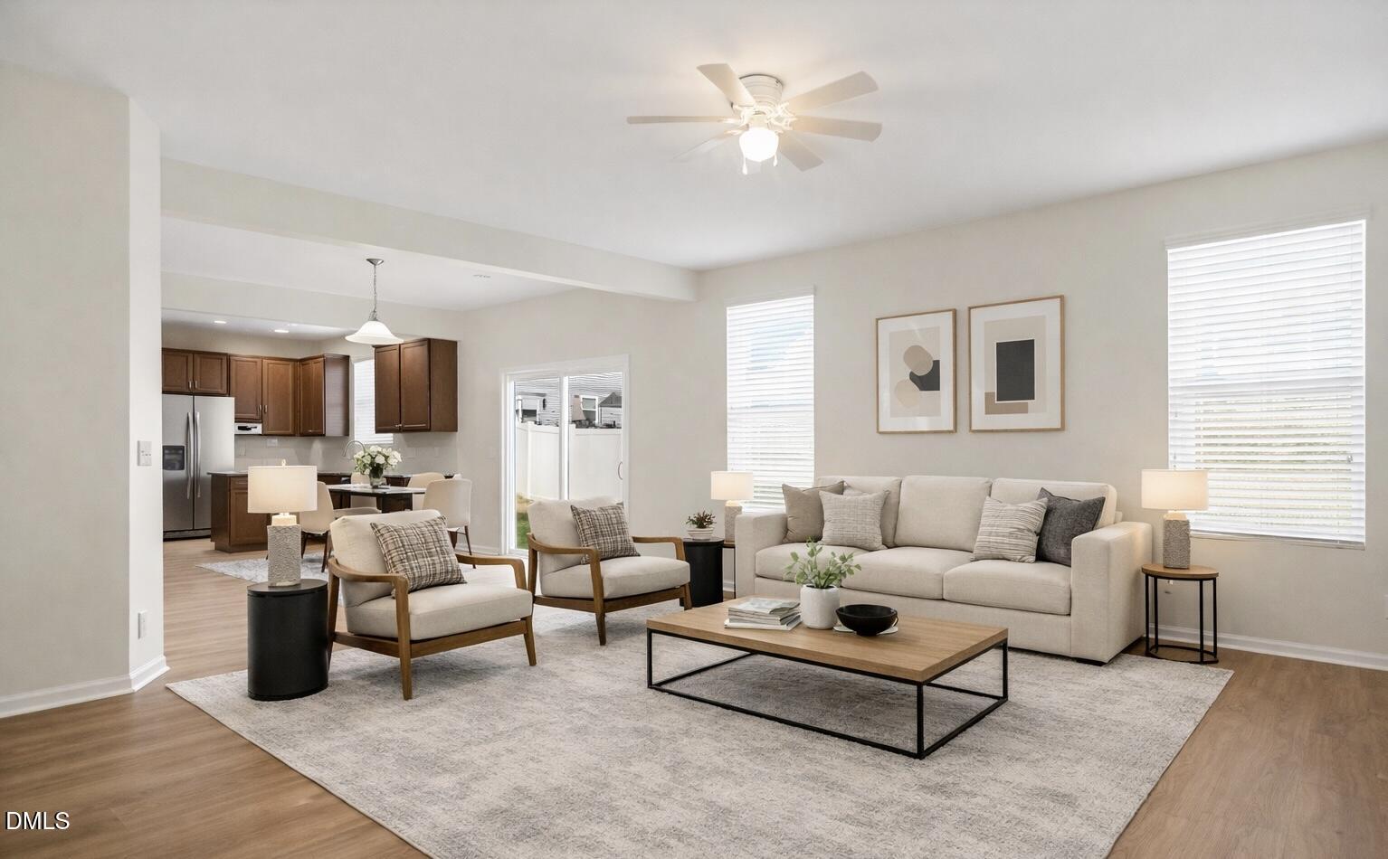 3905 Massey Pointe Court Raleigh, NC 27616 - Photo 1 of 12 a living room with furniture kitchen view and a window