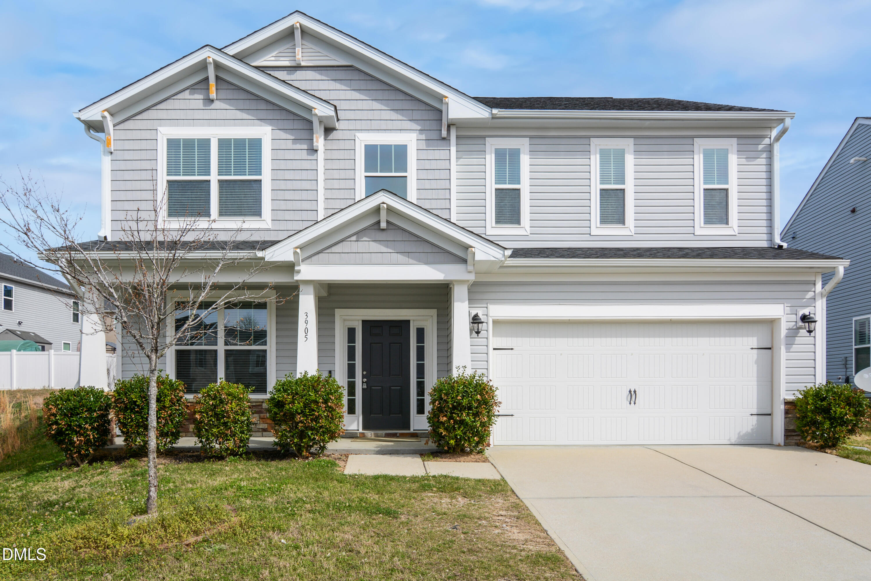 3905 Massey Pointe Court Raleigh, NC 27616 - Photo 2 of 12 a front view of a house with garden
