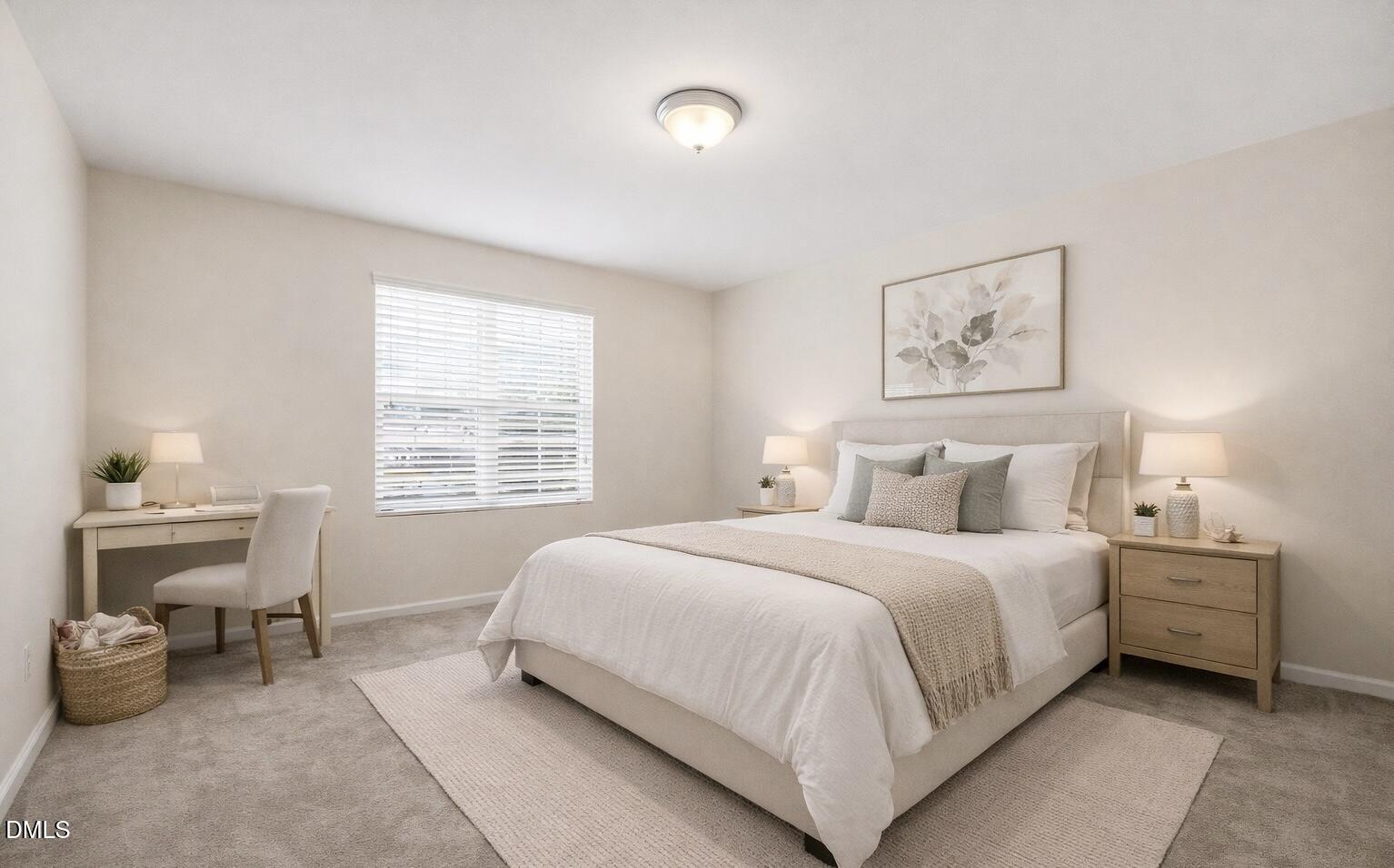 3905 Massey Pointe Court Raleigh, NC 27616 - Photo 8 of 12 a bedroom with a bed and a table