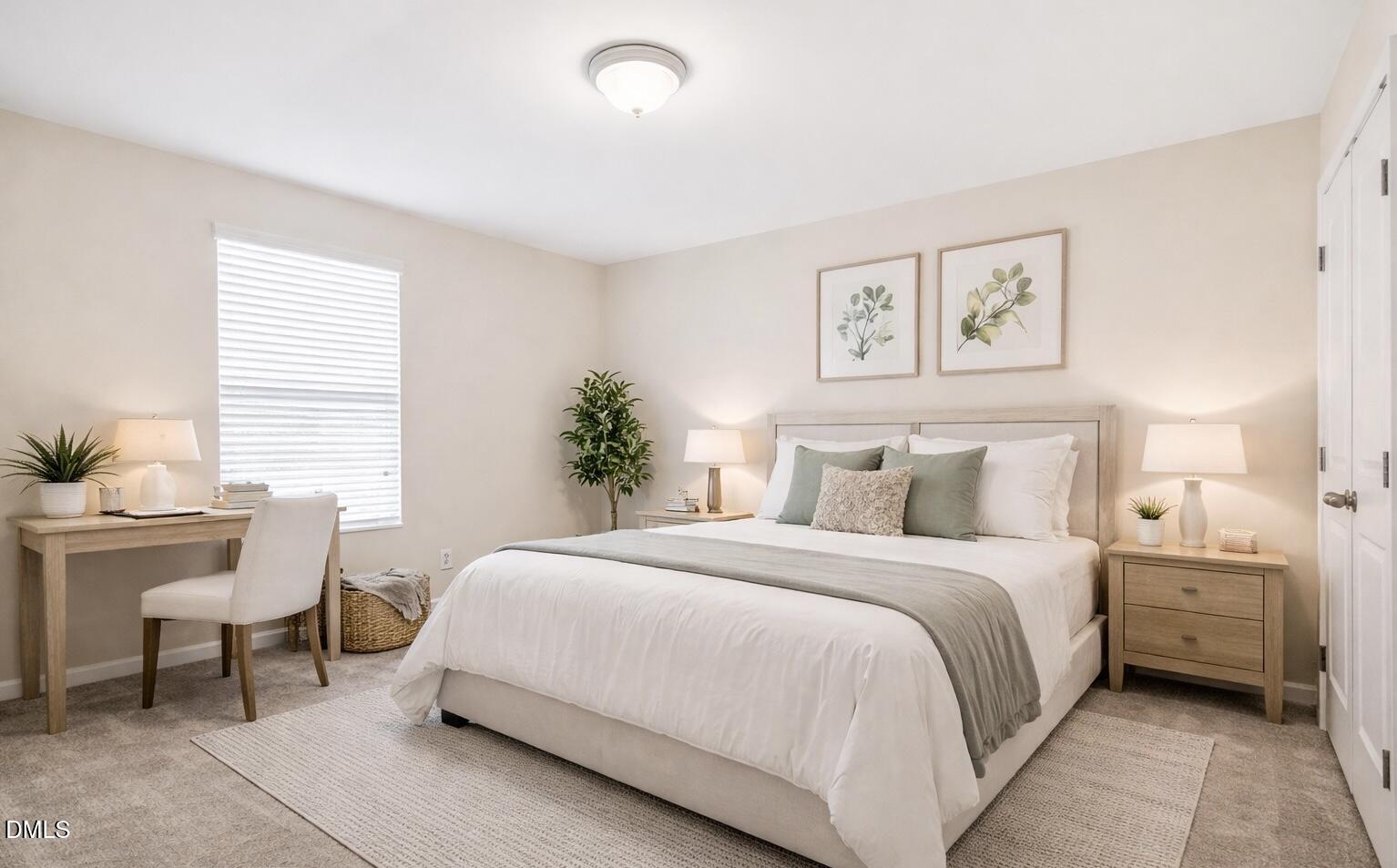 3905 Massey Pointe Court Raleigh, NC 27616 - Photo 10 of 12 a bedroom with a bed and a table