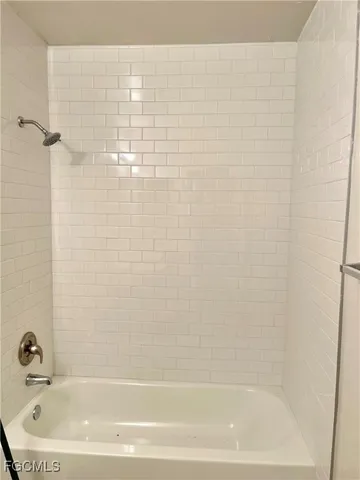 a bathroom with a bathtub