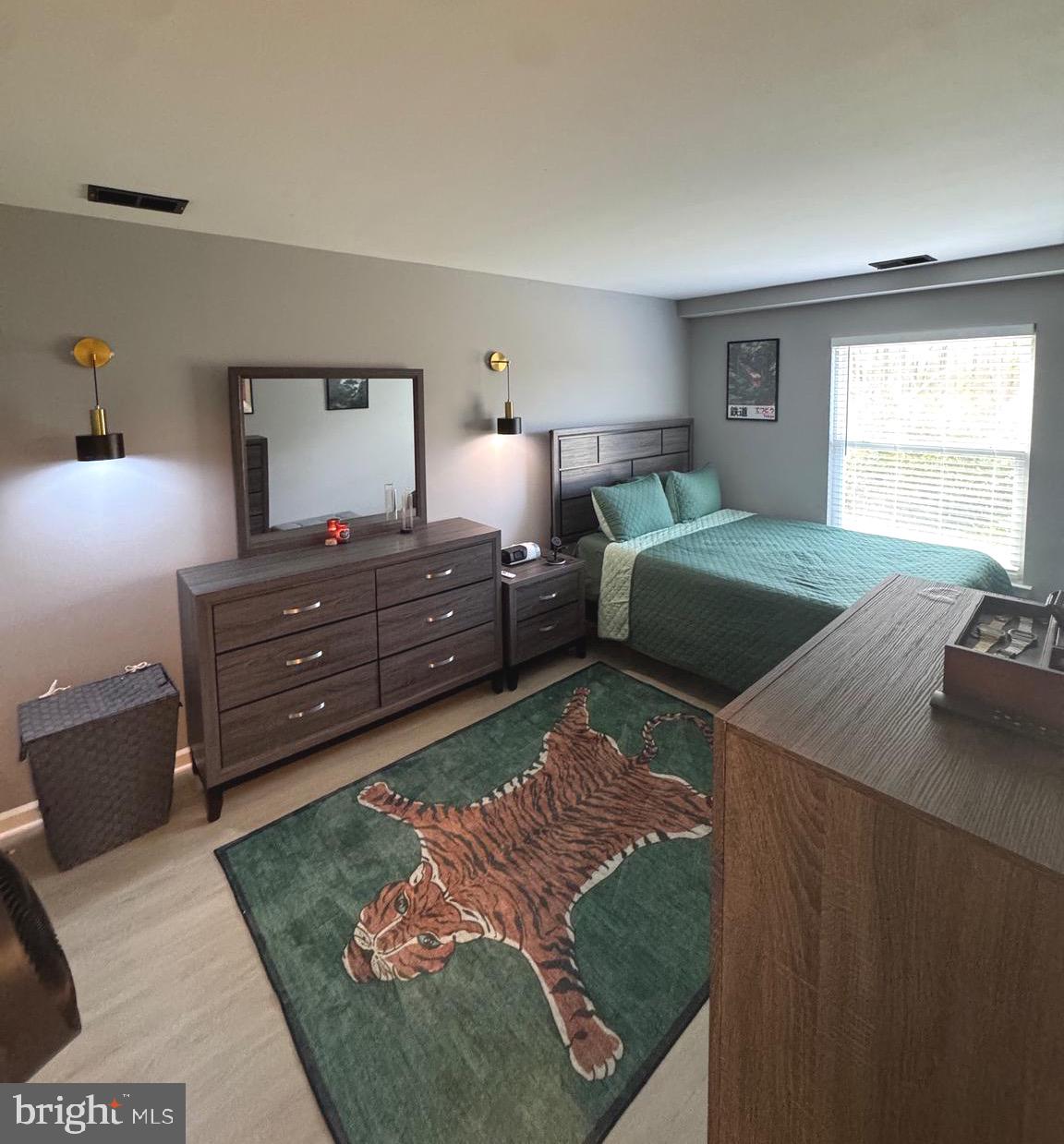 3079 Chester Grove Road, Unit 42E Upper Marlboro, MD 20774 - Photo 12 of 20 a bed room with a bed and a tv