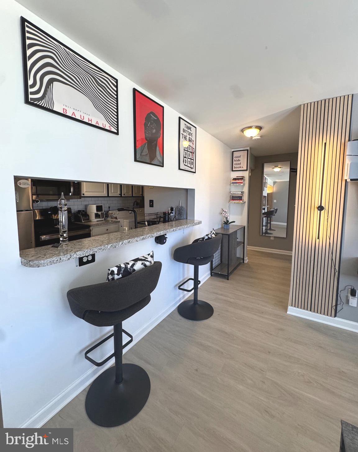 3079 Chester Grove Road, Unit 42E Upper Marlboro, MD 20774 - Photo 7 of 20 a living room with furniture and a wooden floor