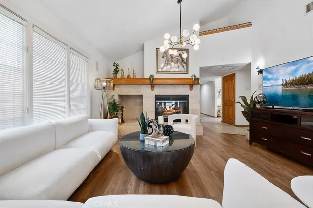 a kitchen with stainless steel appliances granite countertop a stove and a microwave
