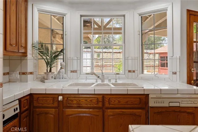 a bed room with a bed and a chandelier