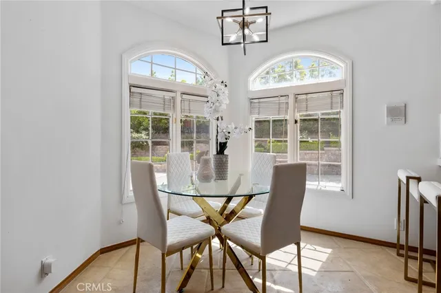 a spacious bedroom with a bed and window