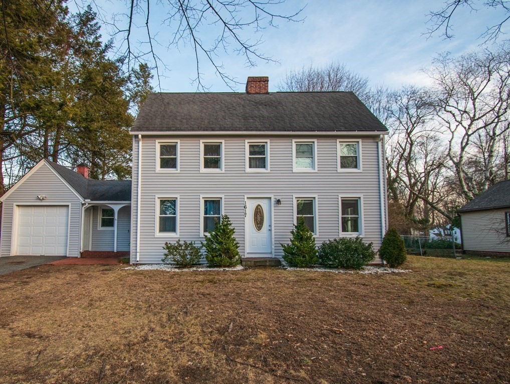 1617 Plumtree Road Springfield, MA 01119 - Photo 1 of 25 a front view of a house with garden