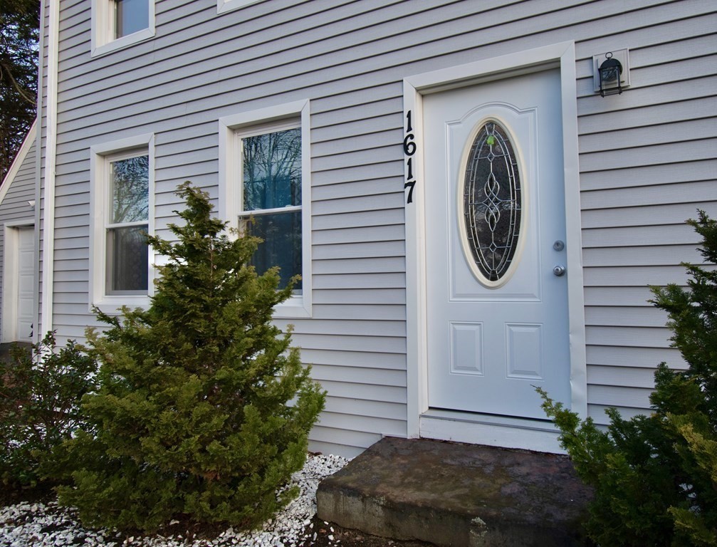 1617 Plumtree Road Springfield, MA 01119 - Photo 2 of 25 a front view of a house with garden