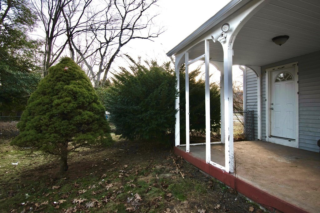1617 Plumtree Road Springfield, MA 01119 - Photo 24 of 25 a view of a house with a yard