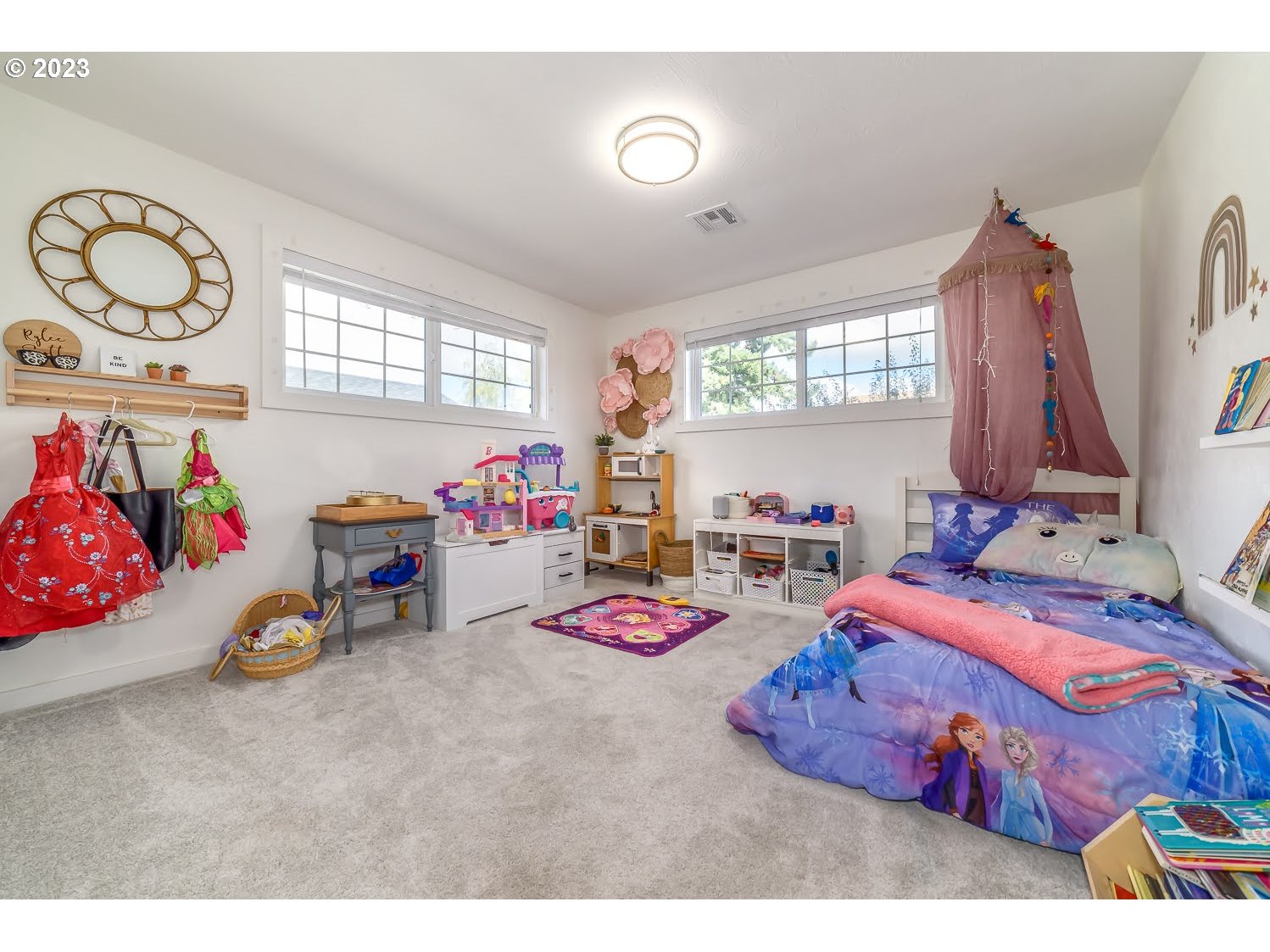 2478 15th Street Springfield, OR 97477 - Photo 18 of 29 a bedroom with furniture and a bed