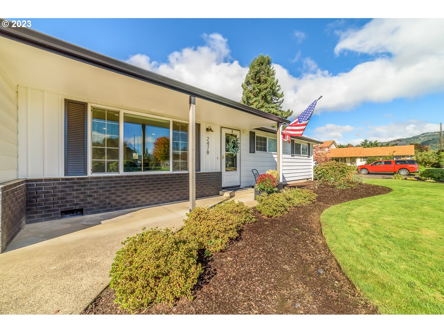 2478 15th Street Springfield, OR 97477 - Photo 3 of 29 a front view of a house with a porch