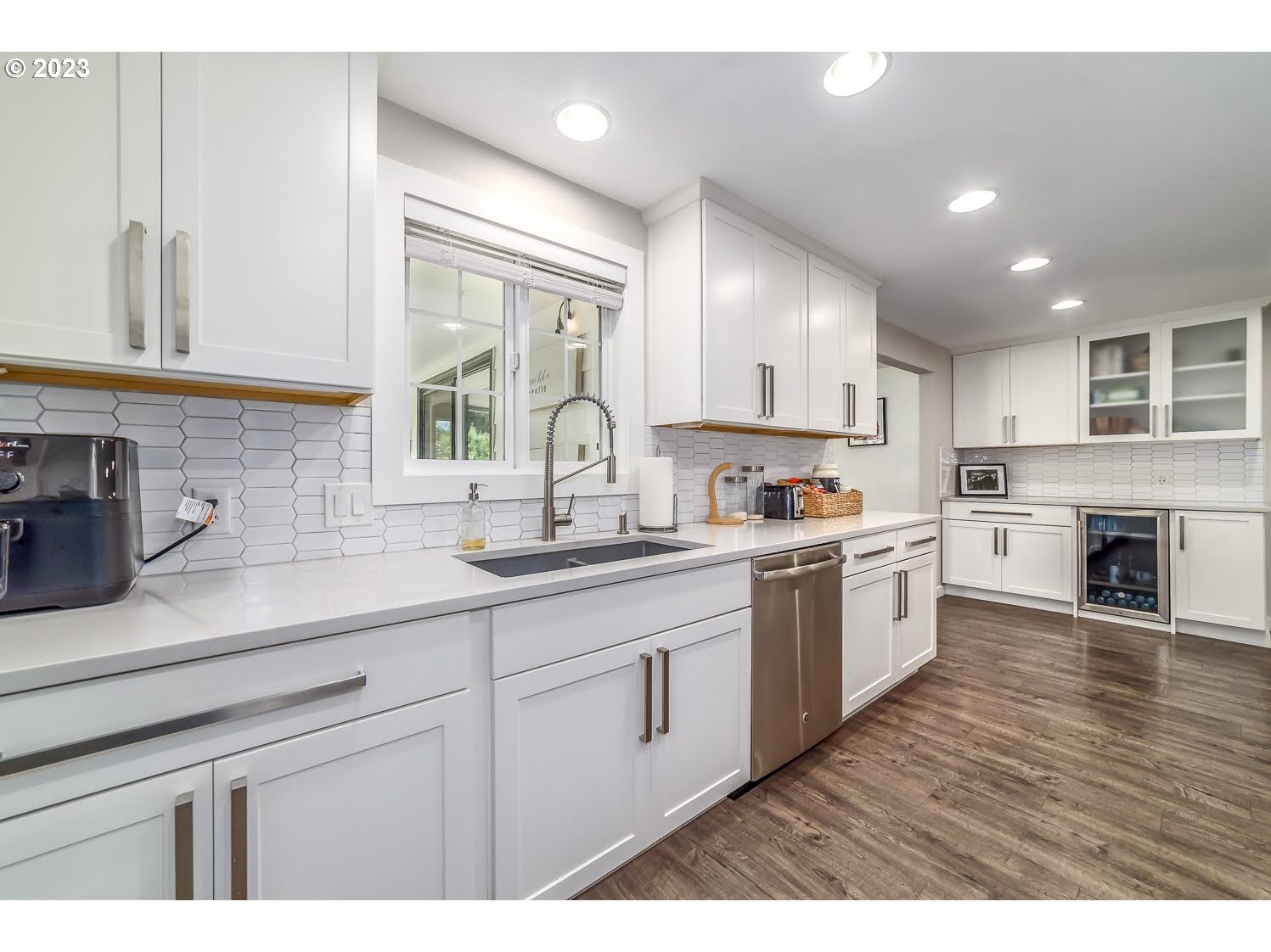 2478 15th Street Springfield, OR 97477 - Photo 10 of 29 a open kitchen with sink cabinets and window