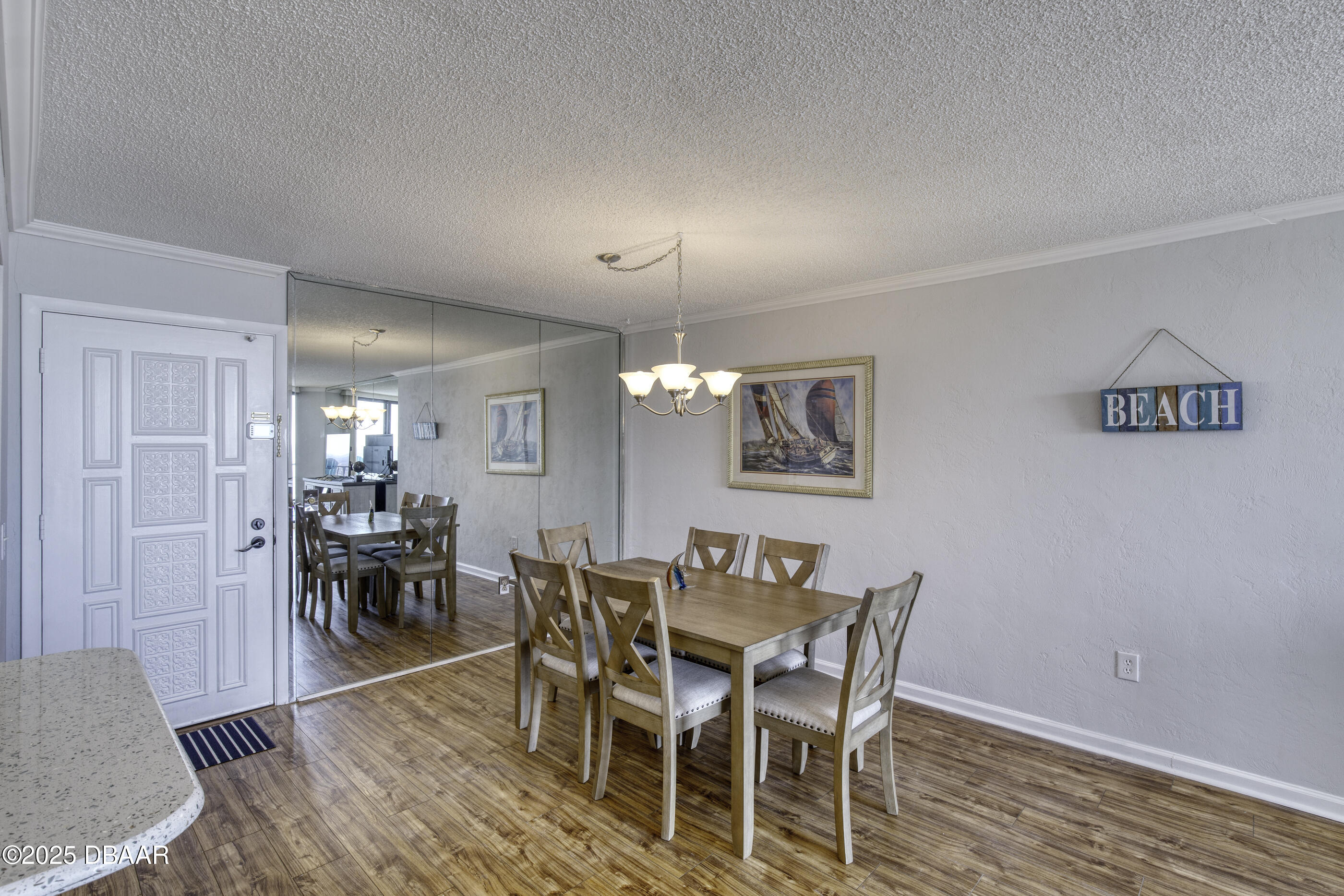 1415 Ocean Shore Boulevard, Unit 1010 Ormond Beach, FL 32176 - Photo 12 of 52 a view of a dining room with furniture