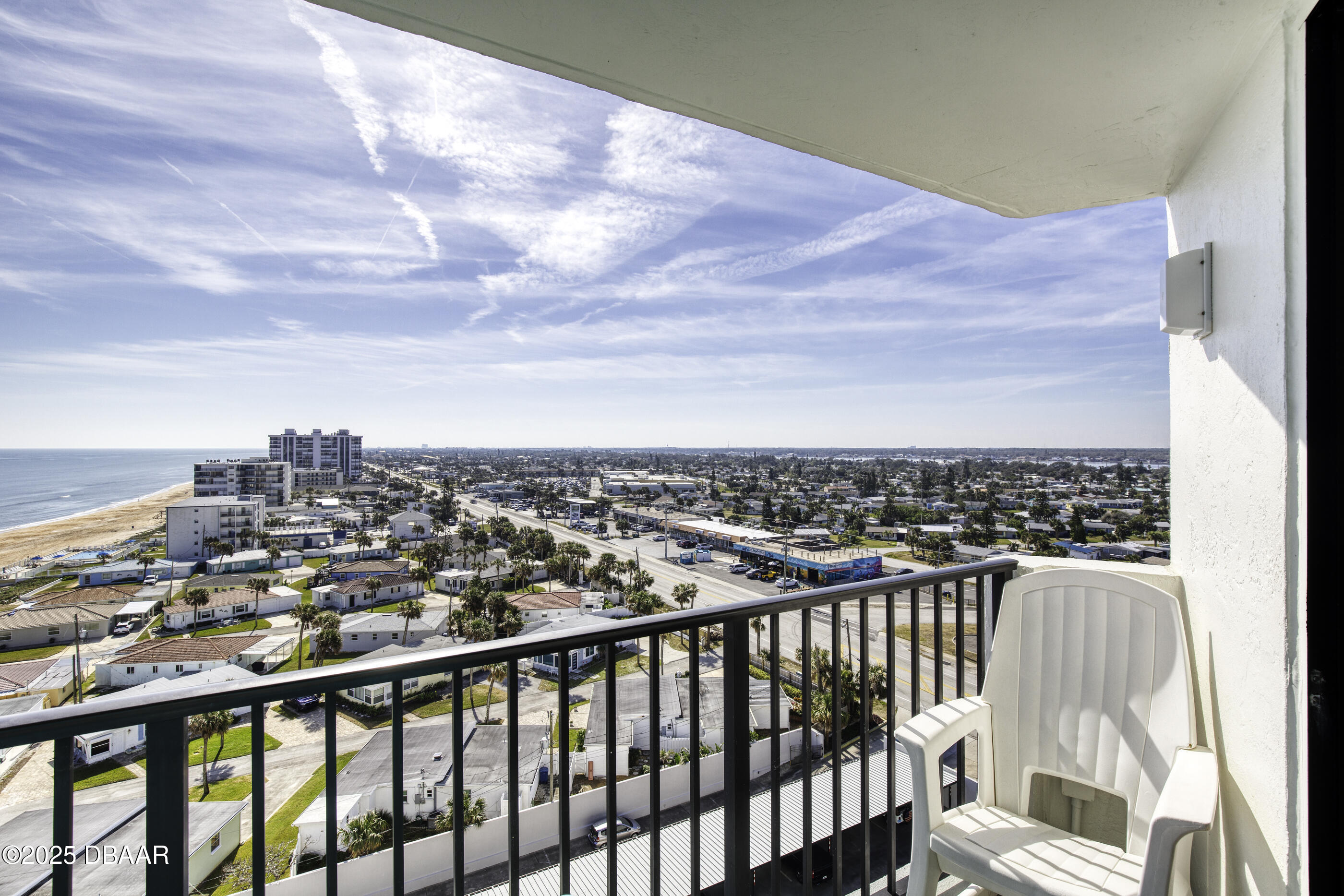 1415 Ocean Shore Boulevard, Unit 1010 Ormond Beach, FL 32176 - Photo 28 of 52 a view of a city from a balcony