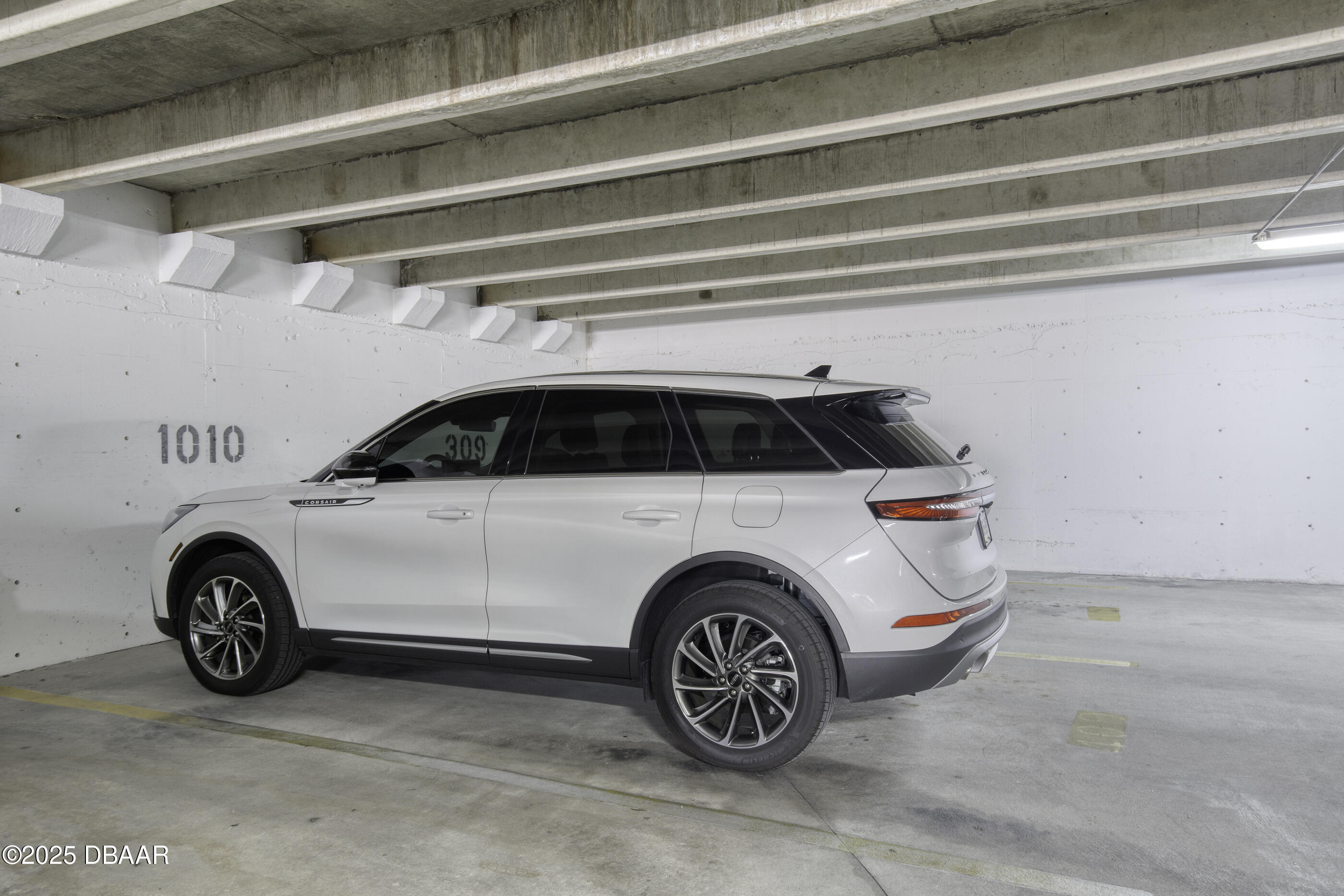 1415 Ocean Shore Boulevard, Unit 1010 Ormond Beach, FL 32176 - Photo 45 of 52 a view of a car in garage