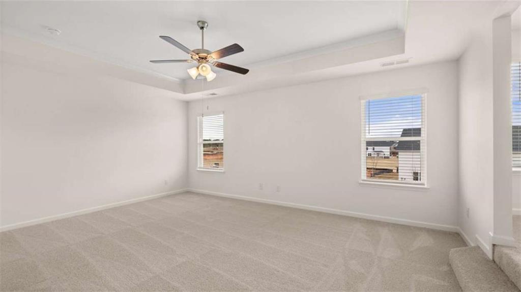 1912 Endress Circle Hampton, GA 30228 - Photo 24 of 43 an empty room with a window and a fan
