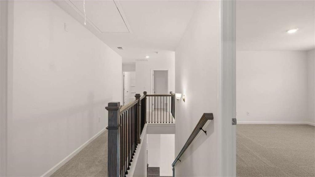 1912 Endress Circle Hampton, GA 30228 - Photo 34 of 43 a view of a hallway with seating area