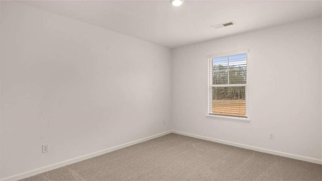 1912 Endress Circle Hampton, GA 30228 - Photo 39 of 43 an empty room with a window
