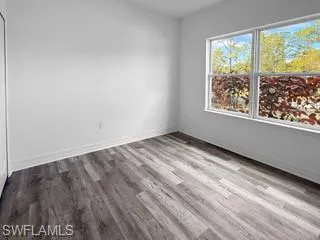 a view of a room that has a window in it