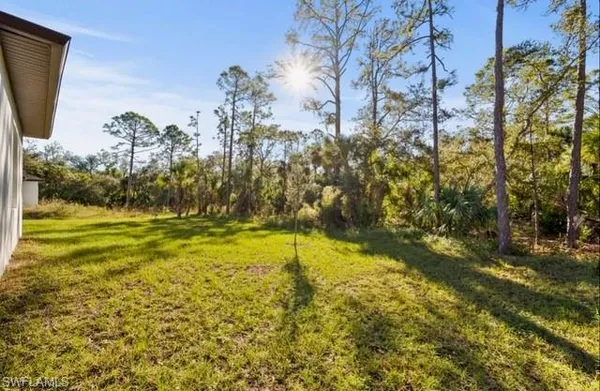a view of swimming pool with an outdoor space and seating area
