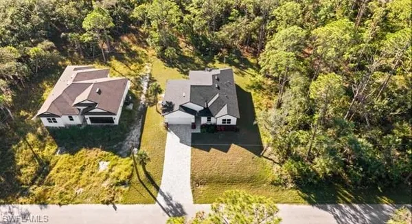aerial view of a house with swimming pool