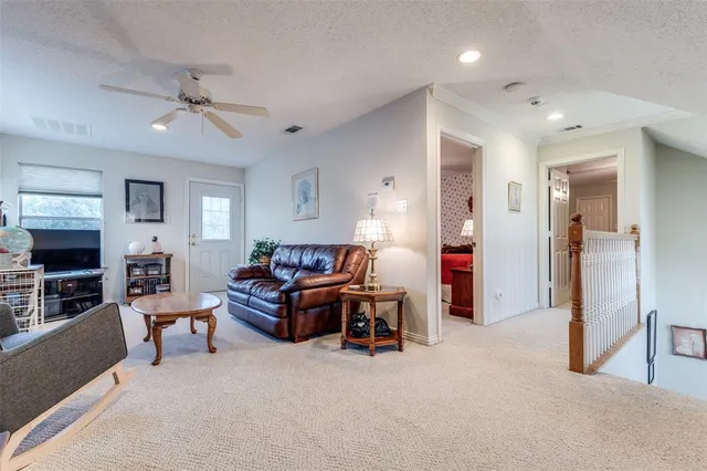 a en suite bathroom with a double vanity sink and a mirror