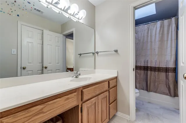 a view of a swimming pool with an outdoor seating and a yard