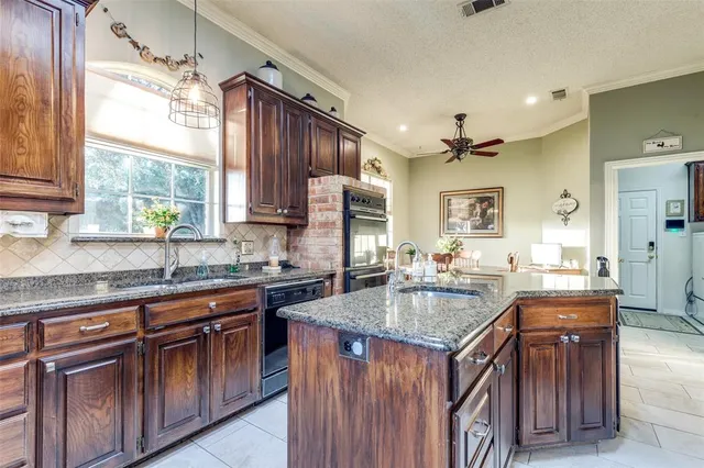 a view of a storage and utility room with washer and dryer