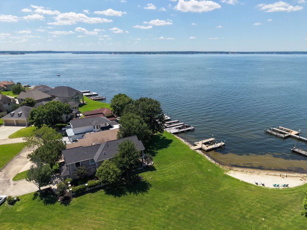 1607 Schooner Point Willis, TX 77318 - Photo 40 of 47 Aerial sideview of home and the expansive view of the lake.