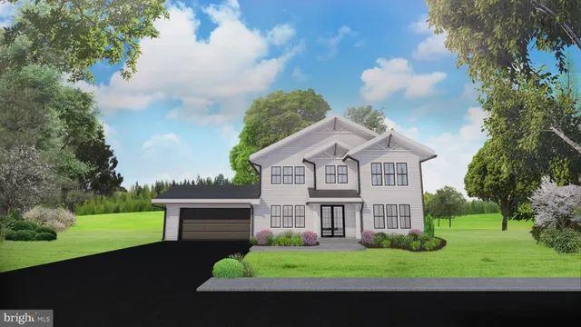 a view of house with a big yard