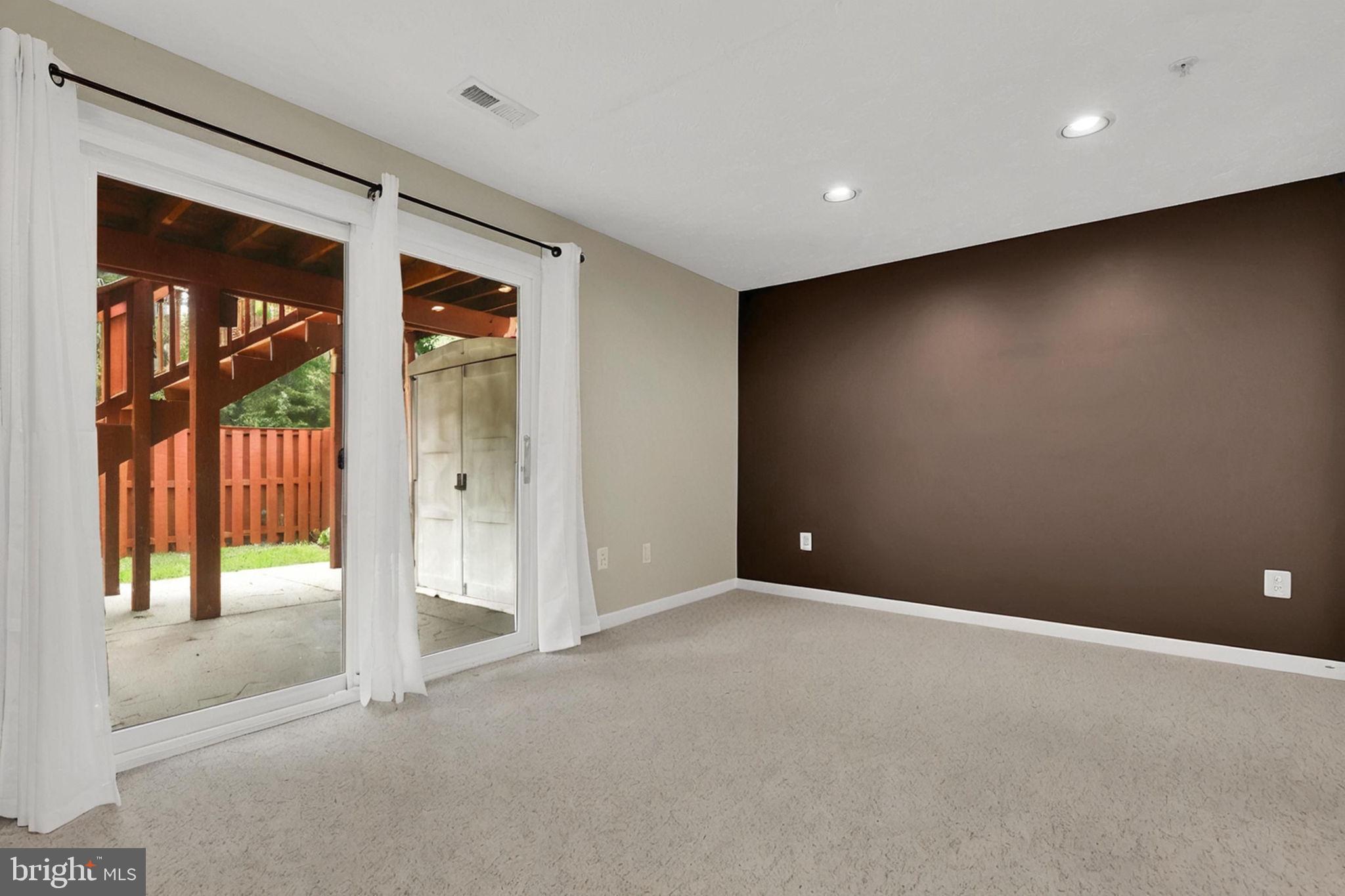 7150 Natures Road Columbia, MD 21046 - Photo 29 of 45 a view of an empty room with a window