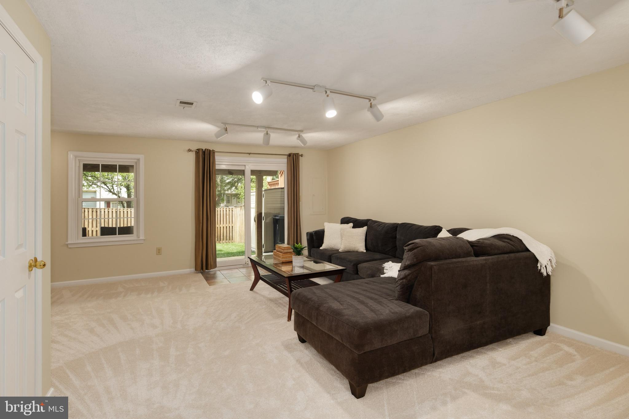 8174 Cliffview Avenue Springfield, VA 22153 - Photo 40 of 55 Huge LL rec room walks out to rear patio and yard