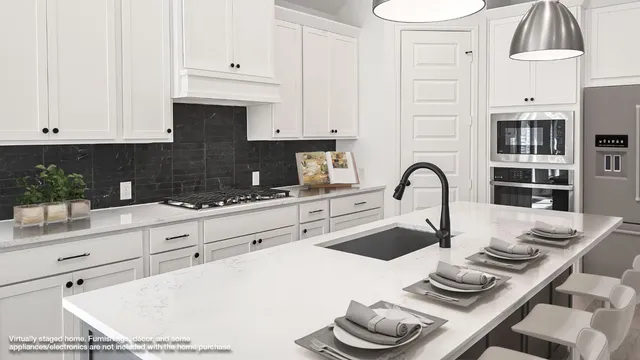 a living room with furniture a rug and a chandelier