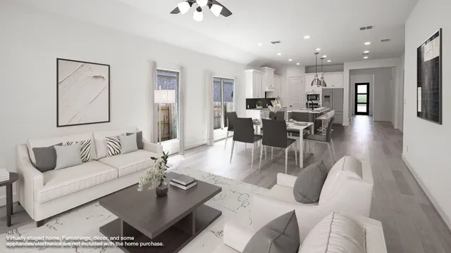 a bedroom with a bed a chandelier and a window