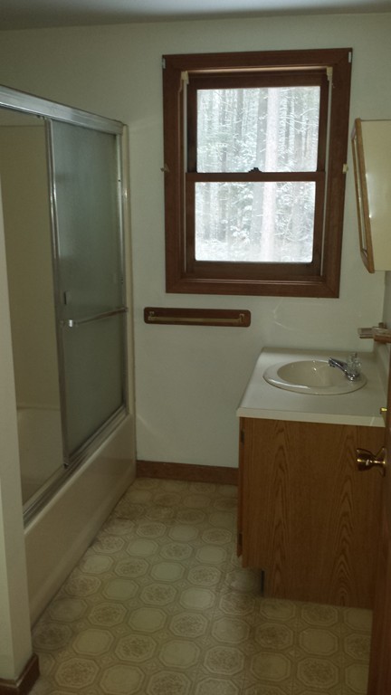 22 Scott Road Townsend, MA 01474 - Photo 16 of 24 a bathroom with a sink and a shower