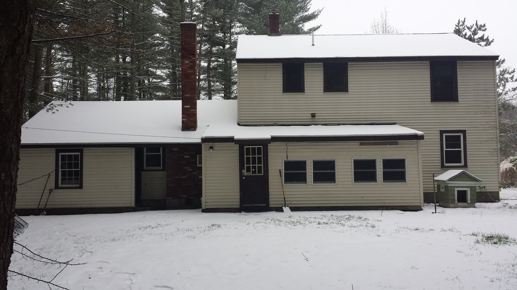 22 Scott Road Townsend, MA 01474 - Photo 22 of 24 a front view of a house with a yard