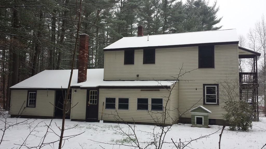 22 Scott Road Townsend, MA 01474 - Photo 4 of 24 a view of a house with a yard