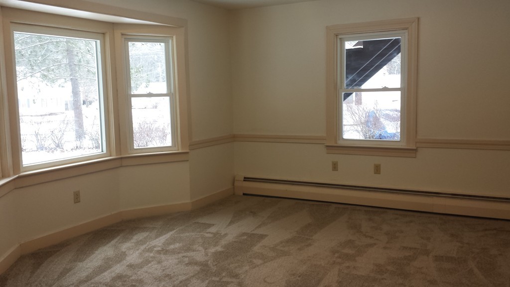 22 Scott Road Townsend, MA 01474 - Photo 7 of 24 an empty room with a window
