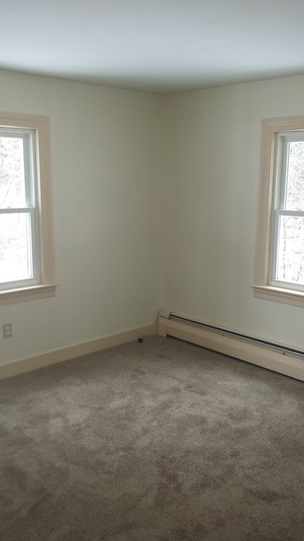 22 Scott Road Townsend, MA 01474 - Photo 8 of 24 an empty room with a window