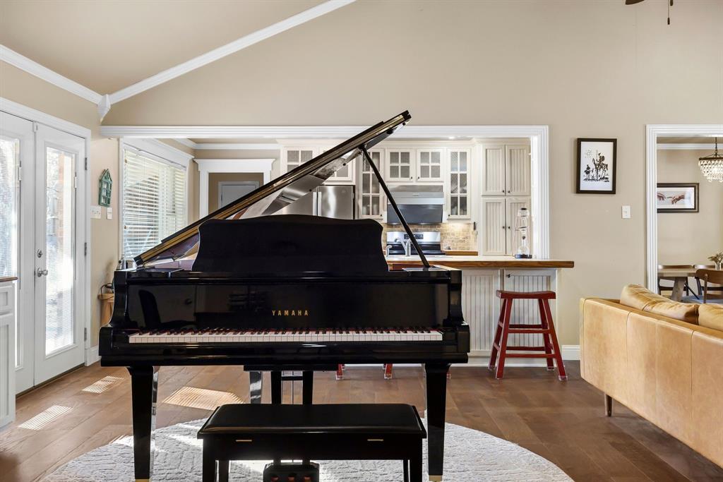 601 Rasure Circle Sulphur Springs, TX 75482 - Photo 16 of 40 a living room with furniture a piano and a window