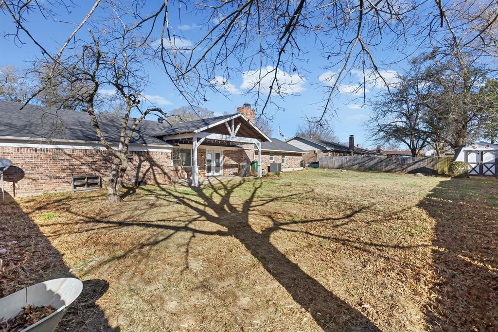 601 Rasure Circle Sulphur Springs, TX 75482 - Photo 37 of 40 a front view of a house with a yard