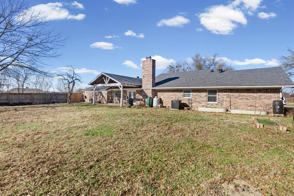 601 Rasure Circle Sulphur Springs, TX 75482 - Photo 38 of 40 a view of a house with a yard